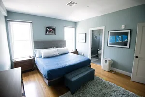 Welcoming bedroom with soothing colors and inviting ambiance.