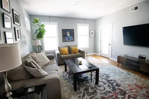 Spacious living area featuring elegant furniture and tasteful decor.