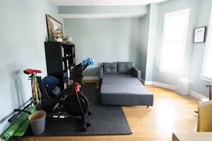 Stylish office area seamlessly integrated with fitness features.