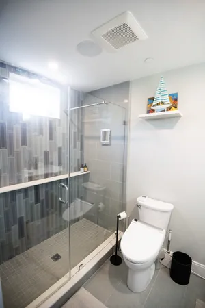 Private ensuite bathroom featuring contemporary design and premium finishes.